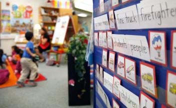 word wall in first grade classroom filled with vocabulary words